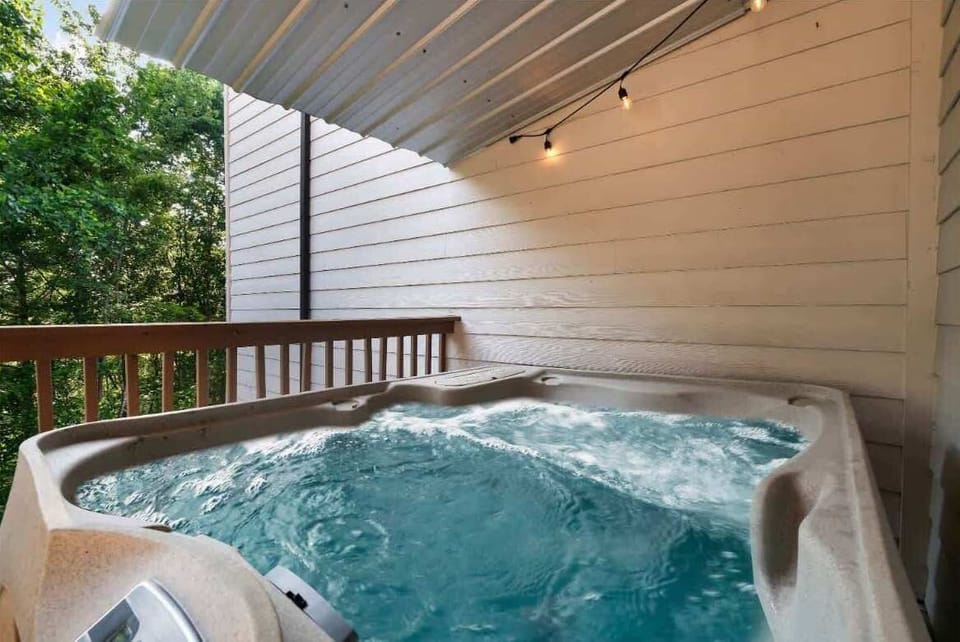Relax under the stars in your private hot tub, surrounded by nature's beauty!