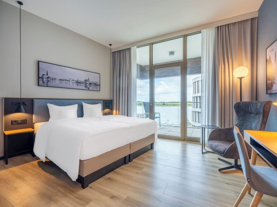 Premium Double Room, Terrace, Harbor View | Hypo-allergenic bedding available, down comforters, minibar