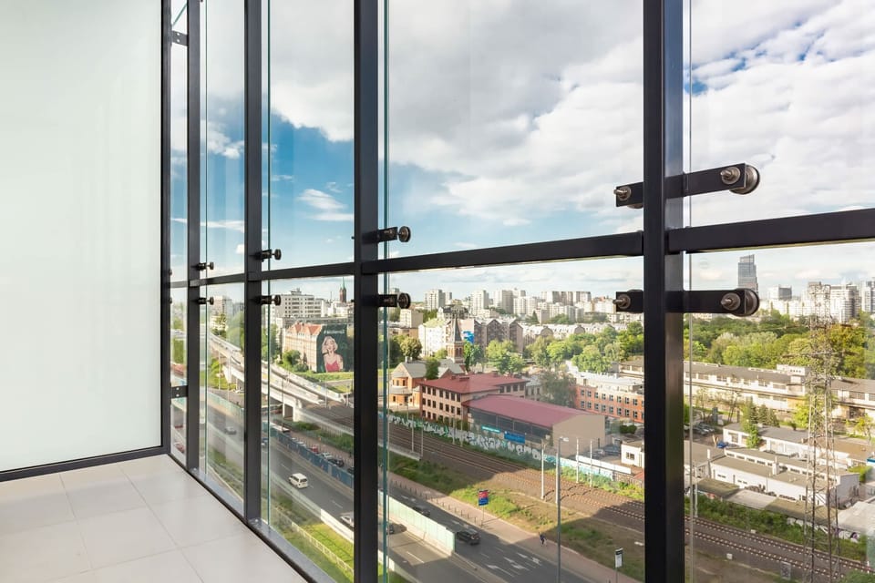 View from the glazed balcony on the city panorama.