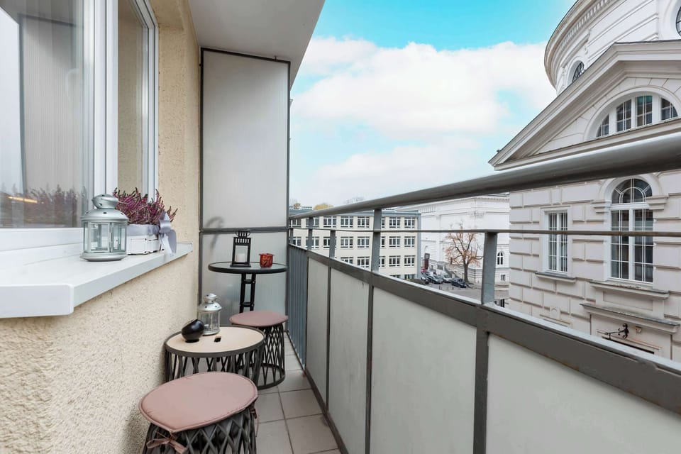 Balcony with seating area and countryside views.