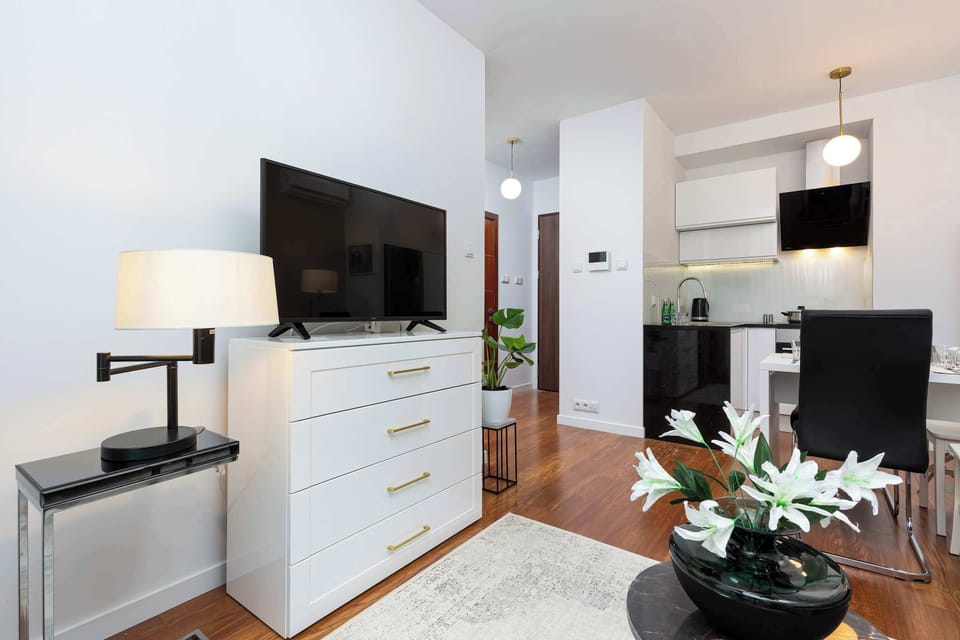 Living room with television and cabinet.