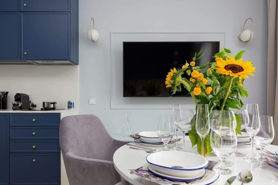 Dining table with tableware.