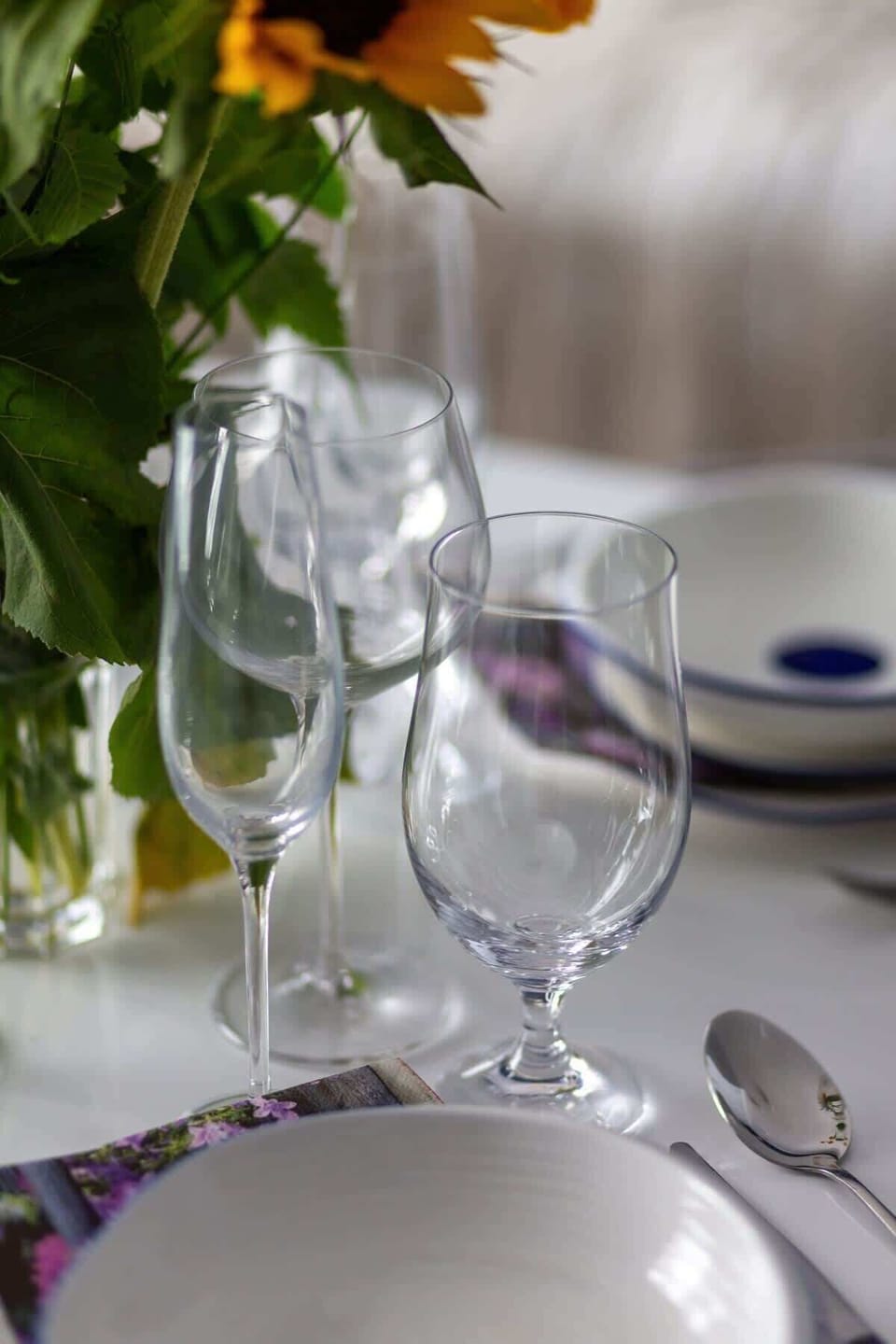 Dining table with tableware.