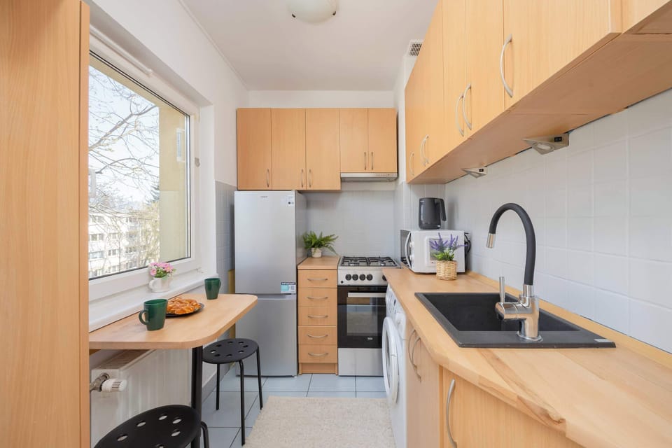 A fully equipped modern kitchen lets you cook comfortably throughout your stay.