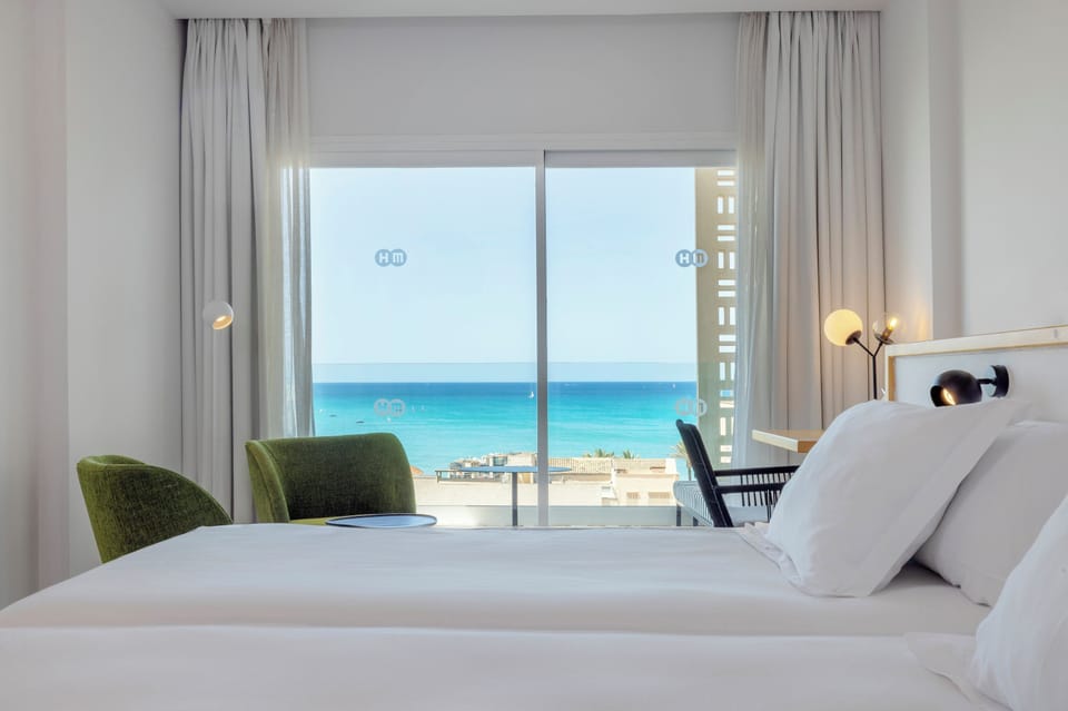 Double Room, Balcony, Partial Sea View | In-room safe, desk, blackout drapes, iron/ironing board