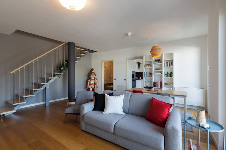 Deluxe Duplex, City View | Living area | 43-inch Smart TV with digital channels