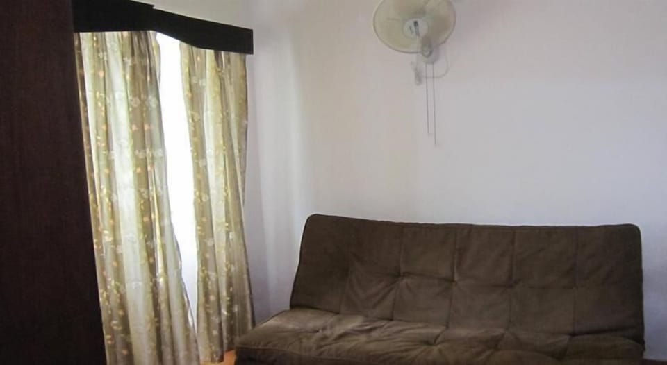 Basic Double Room, 1 Double Bed, Smoking | Living area | TV