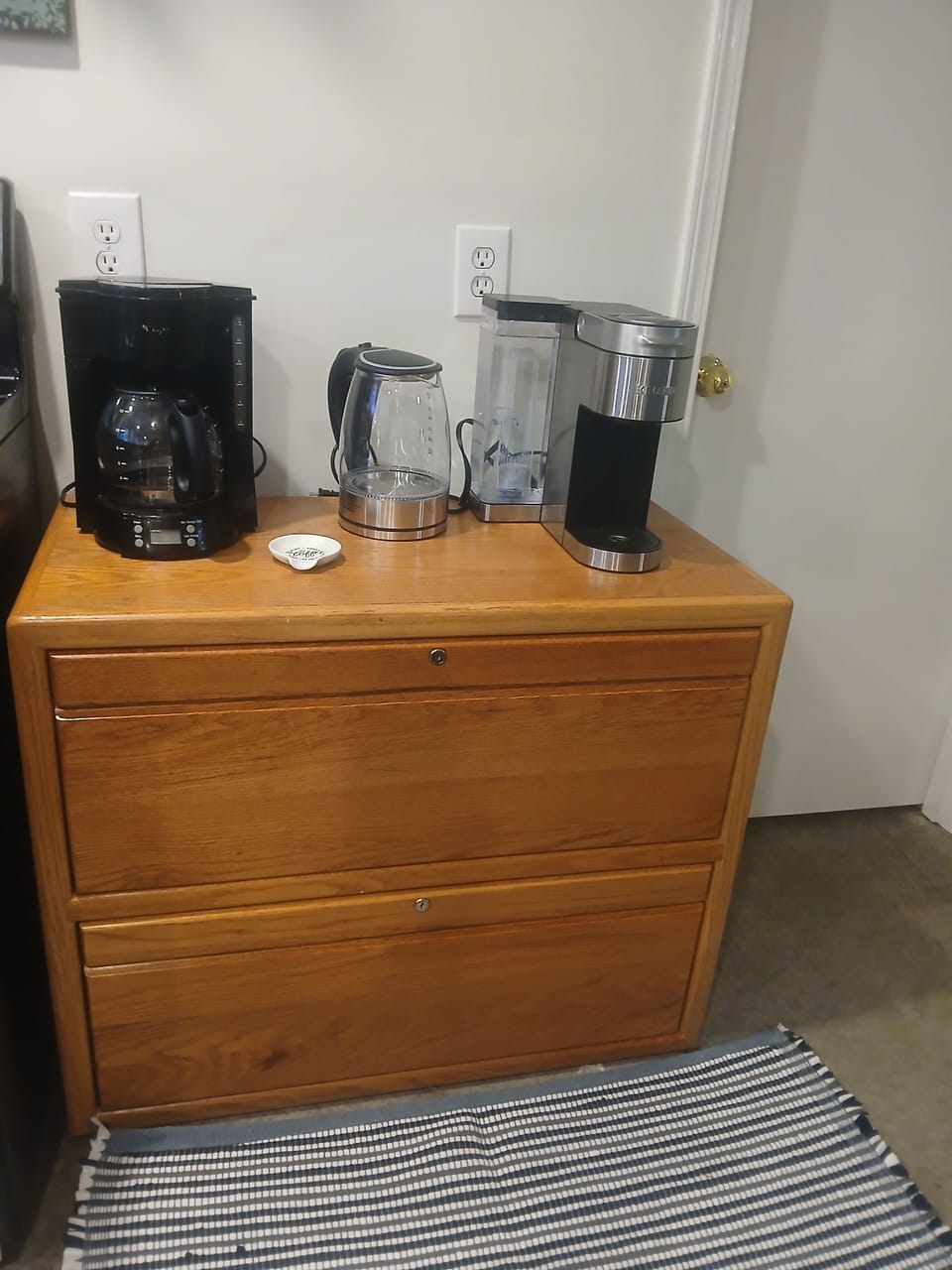 In the coffee bar, the top drawer provides all the essentials. 