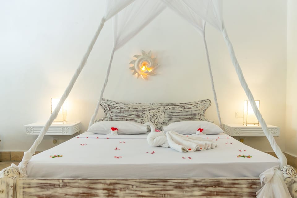 Egyptian cotton sheets, premium bedding, minibar, in-room safe