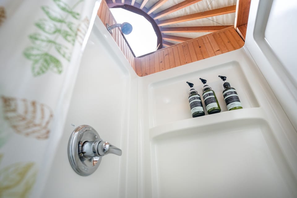 Cabin, Multiple Beds, Ocean View, Oceanfront | Bathroom | Shower, eco-friendly toiletries, towels, soap