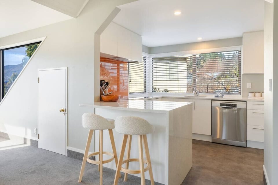 Open plan living with modern kitchen and appliances