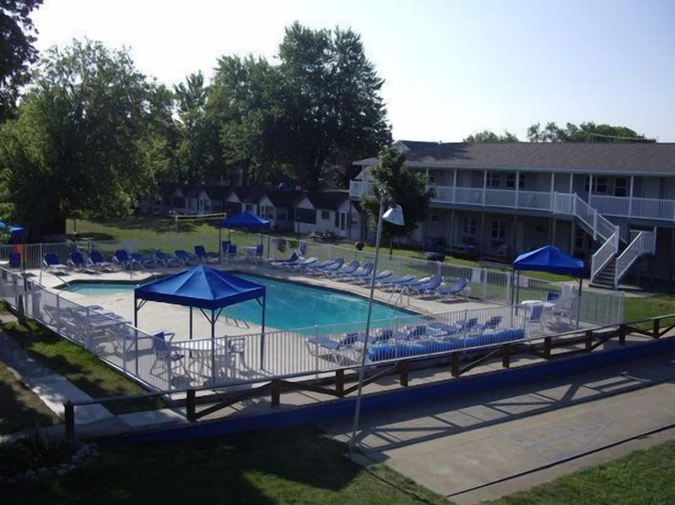 Seasonal outdoor pool, open 10 AM to 10 PM, pool umbrellas, sun loungers