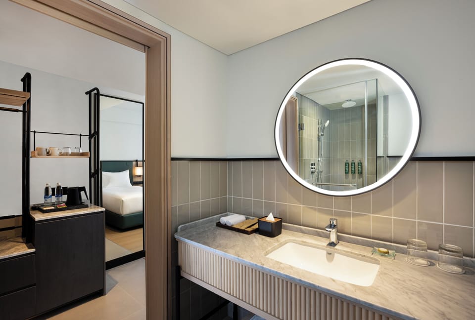 Shower, hydromassage showerhead, designer toiletries, hair dryer