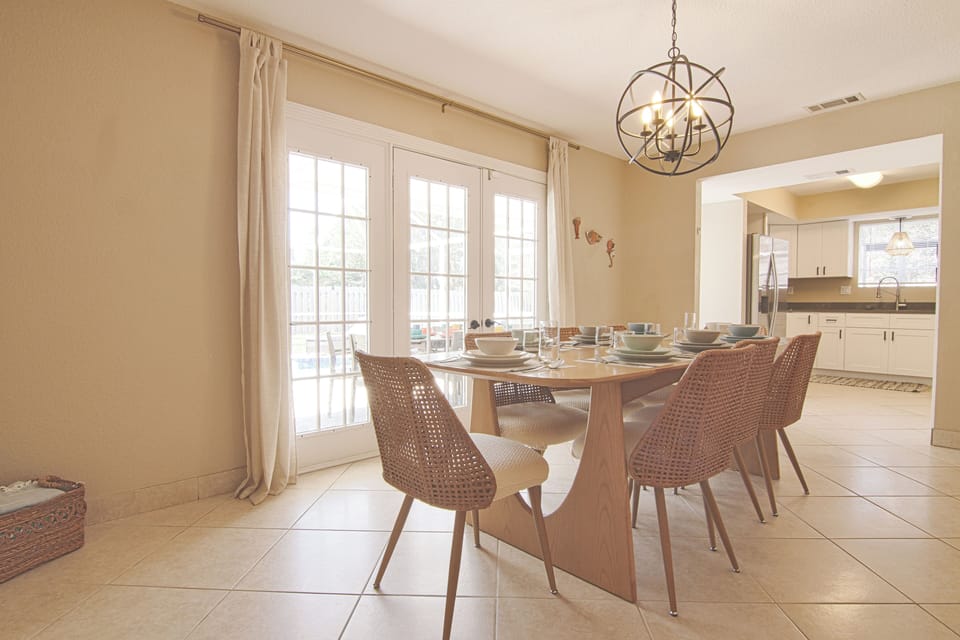 Dining room with patio doors out to the pool deck