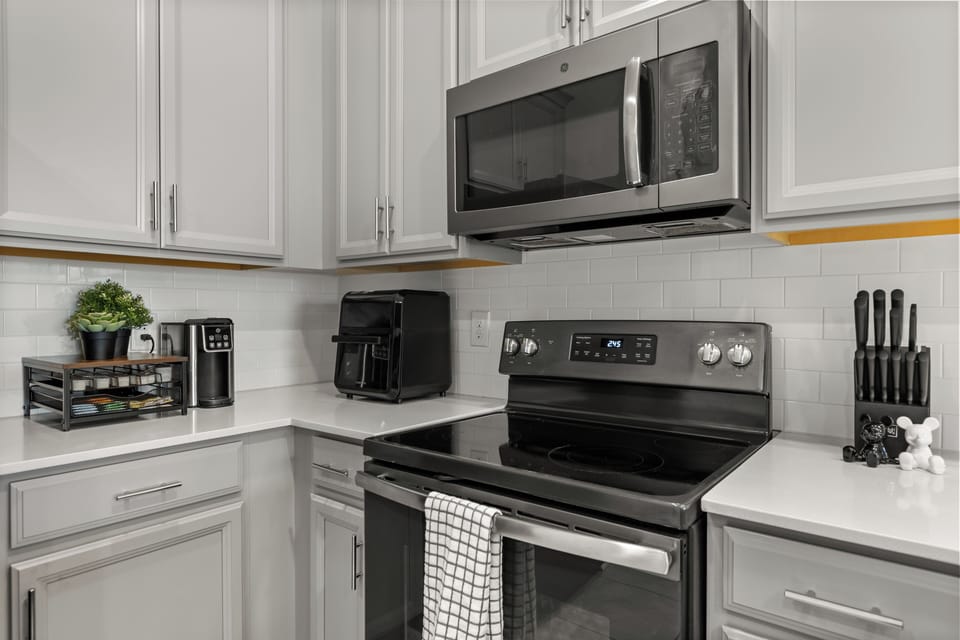 Microwave, air fryer, toaster, and coffee maker included.