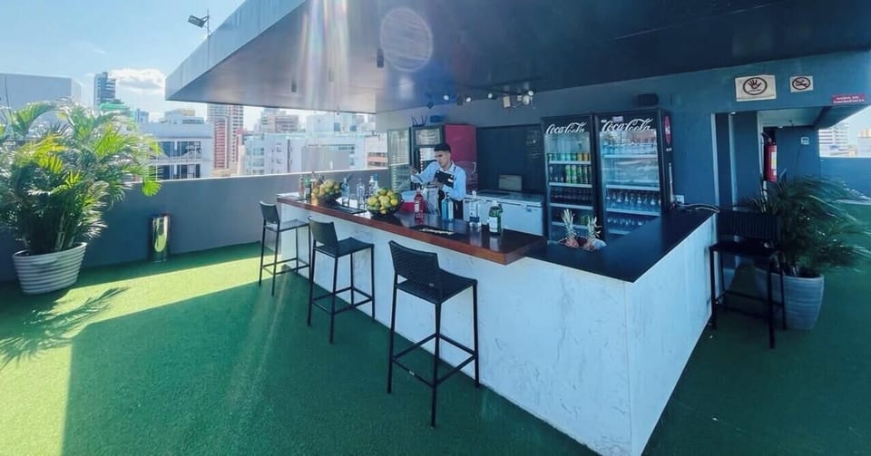 Quadruple Room | Bar (on property)