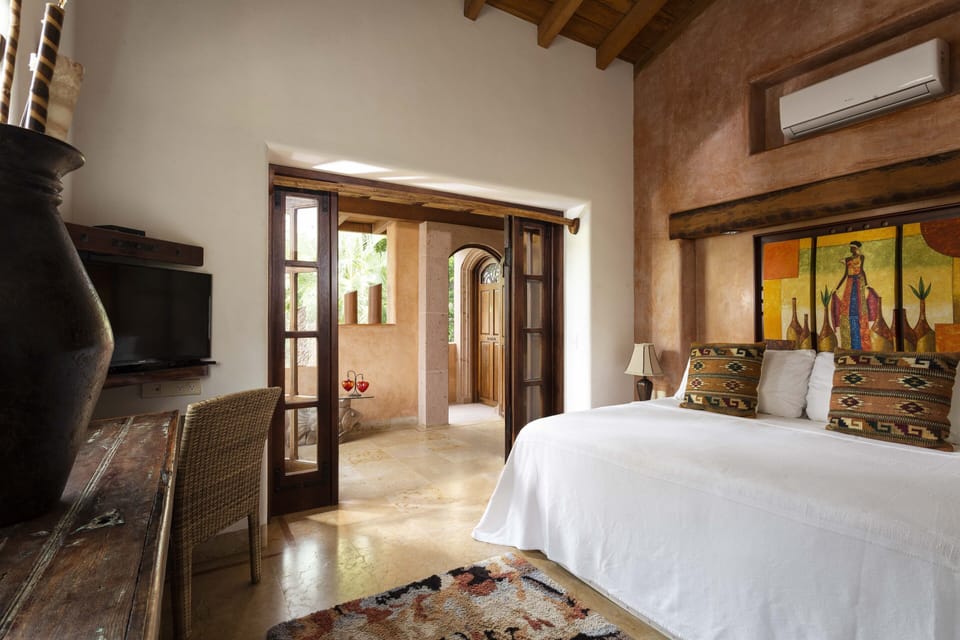 Terrace Suite, 2nd level, non ocean view | Egyptian cotton sheets, premium bedding, pillowtop beds, in-room safe