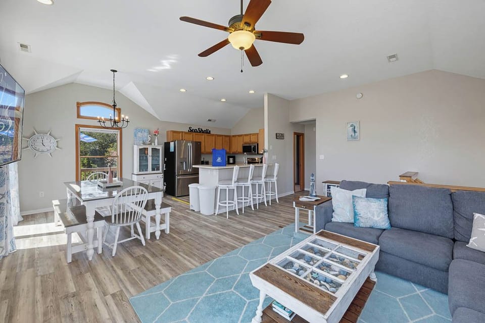 Top-Level Living Room with Deck Access