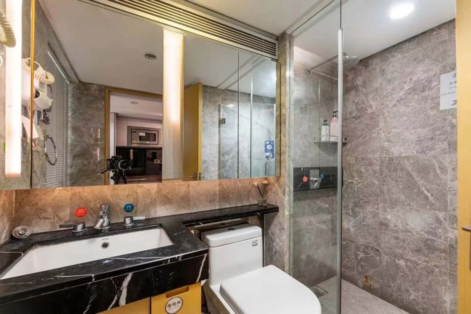Superior Double Room, City View | Bathroom | Shower, hair dryer, slippers, towels