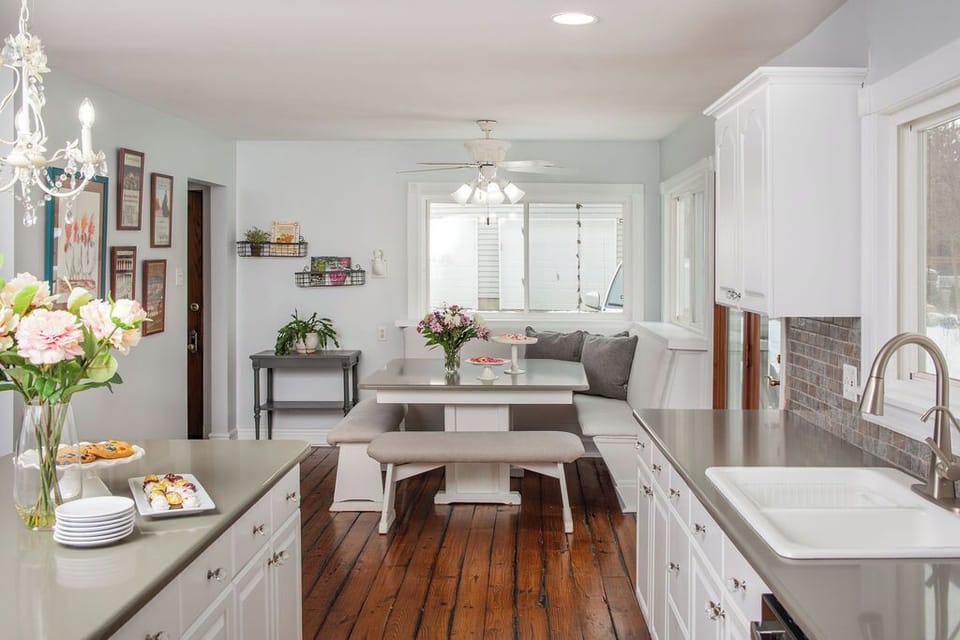 Spacious kitchen w/ island, dual dishwashers, coffee station and breakfast nook