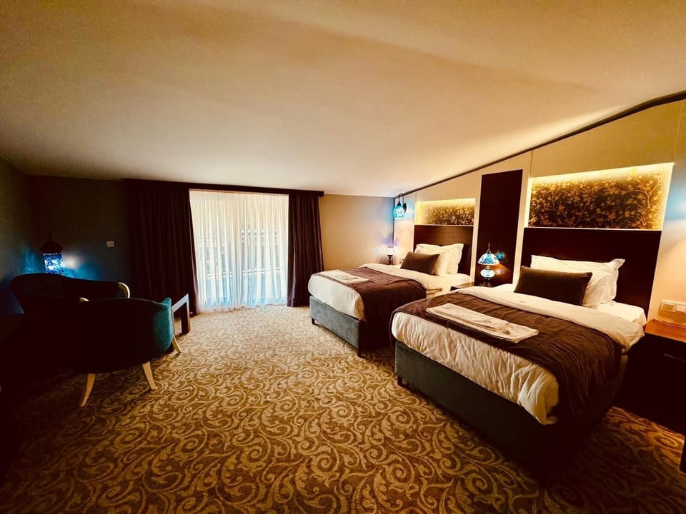 Deluxe Twin Room, 1 Bedroom, Lanai | Premium bedding, minibar, in-room safe, individually decorated
