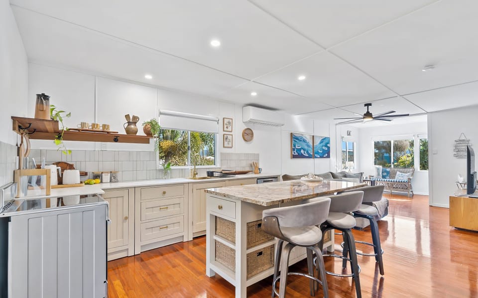 Upstairs kitchen and island dining