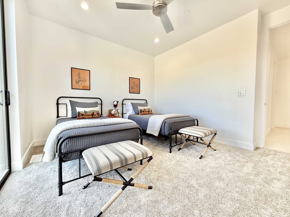 Spacious twin room with plenty of natural light — perfect for families, friends, or kids to spread out comfortably