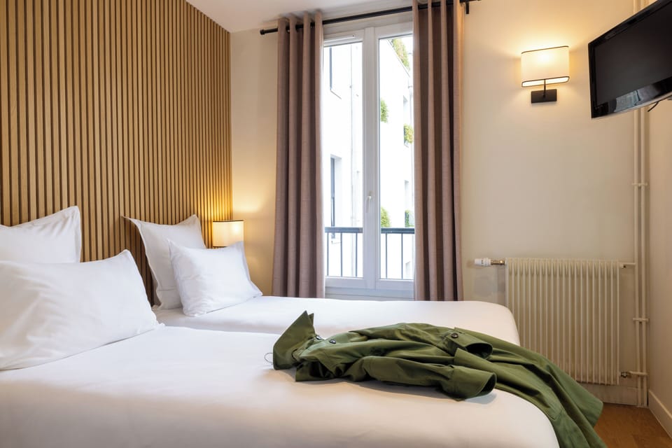 Premium bedding, desk, laptop workspace, soundproofing