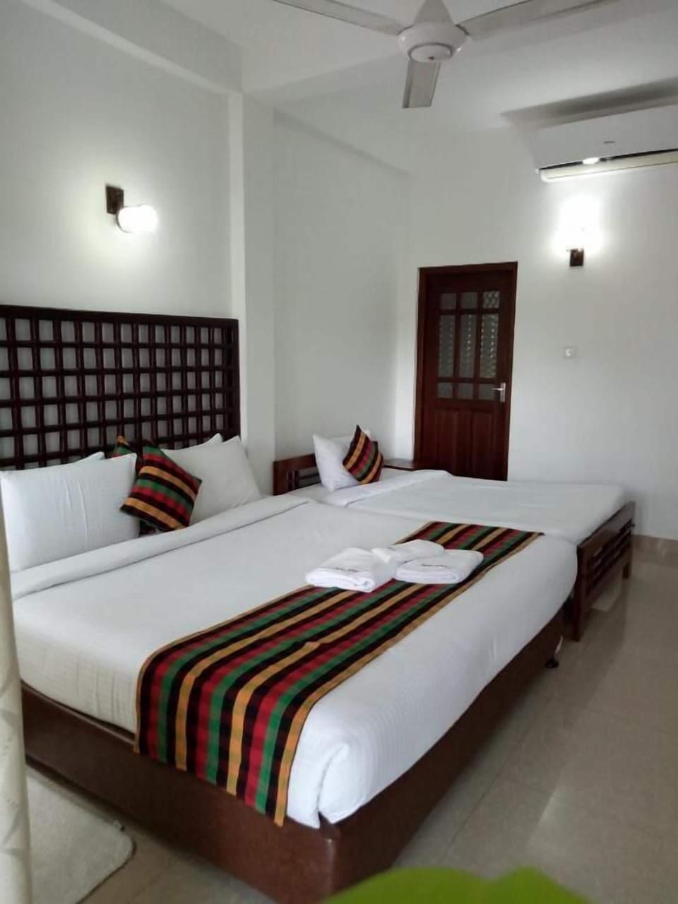 Standard Triple Room, Balcony | In-room safe, iron/ironing board, free WiFi, bed sheets