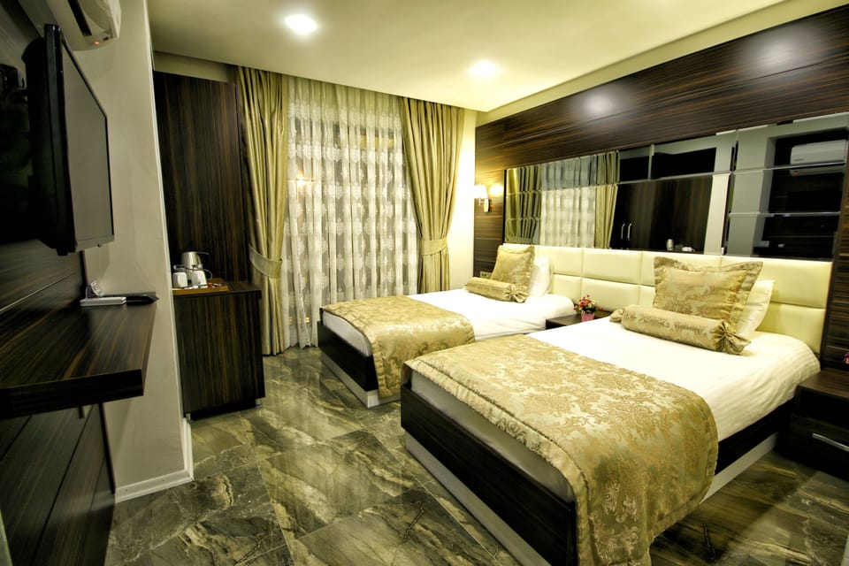 Premium bedding, minibar, soundproofing, free cribs/infant beds