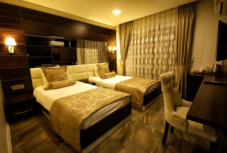 Premium bedding, minibar, soundproofing, free cribs/infant beds