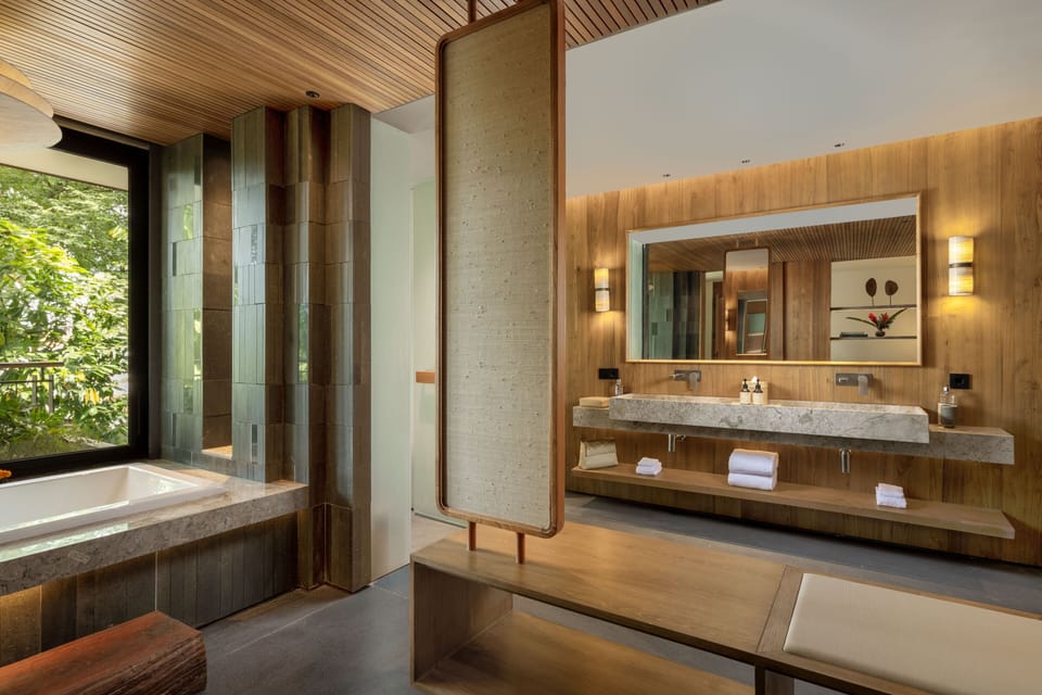 Suite | Bathroom | Separate tub and shower, rainfall showerhead, free toiletries