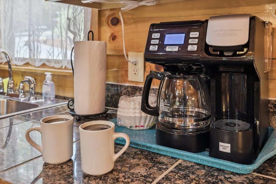  Start your day with fresh brews and scenic views in this charming kitchen nook!