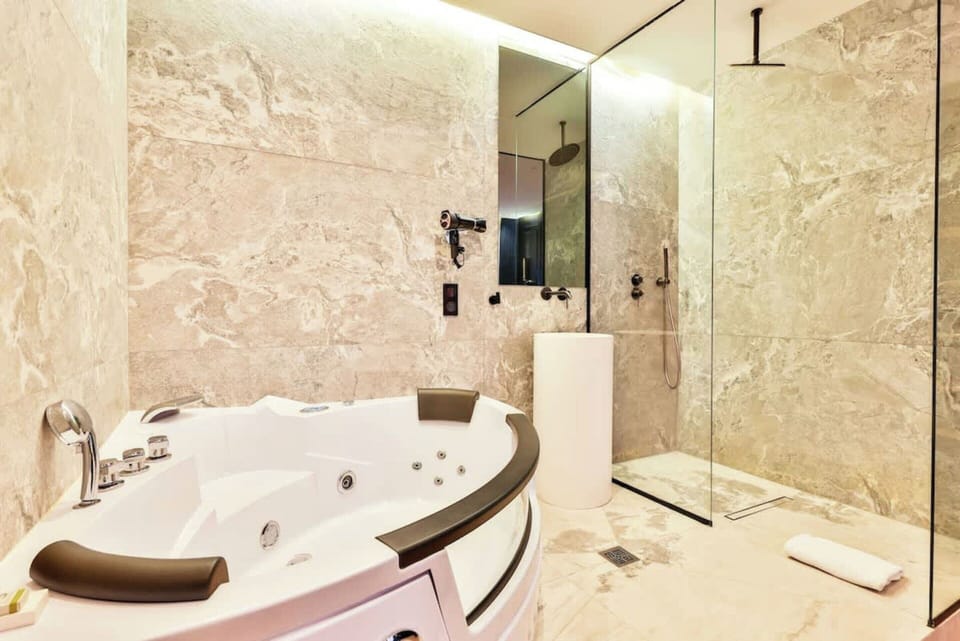 House | Bathroom | Bathtub, hair dryer, towels, soap