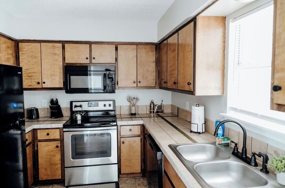 The kitchen is fully equipped with modern appliances and all the essentials you need to prepare delicious meals