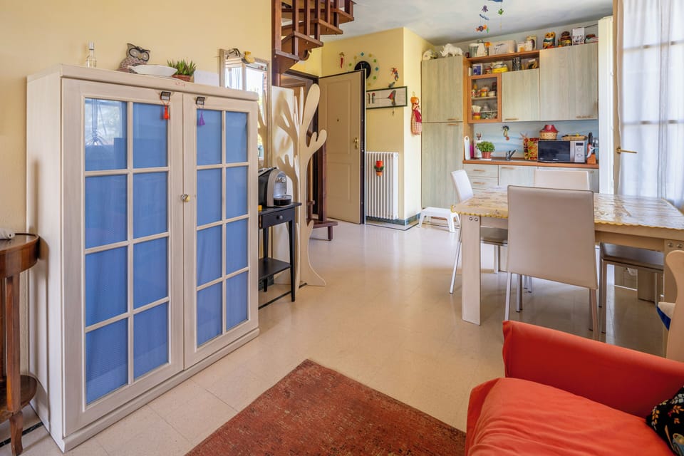 Apartment, Balcony, City View | Living area | 32-inch flat-screen TV with cable channels