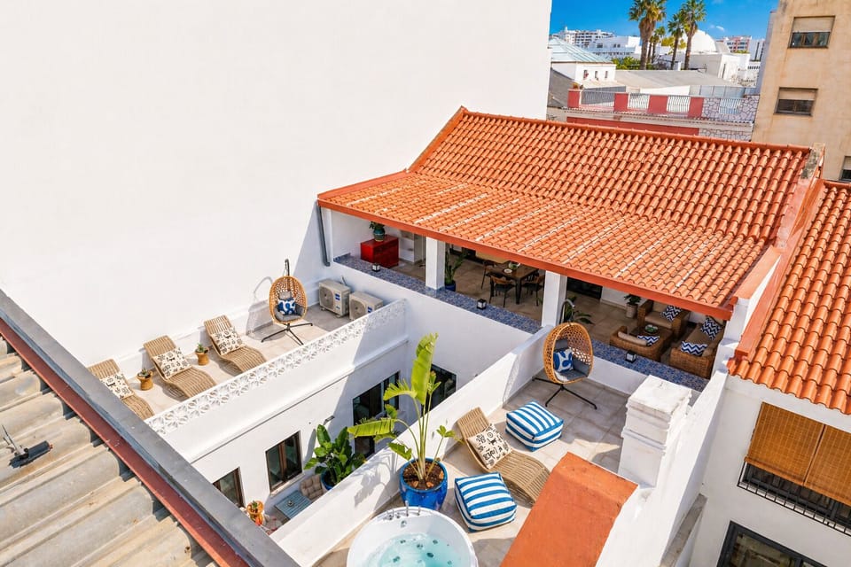 Patios and Terraces with hot tub /  jacuzzi bath sunloungers and seating