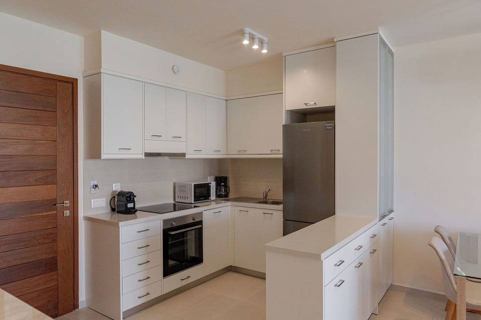 Luxury Apartment, Pool View | Private kitchen