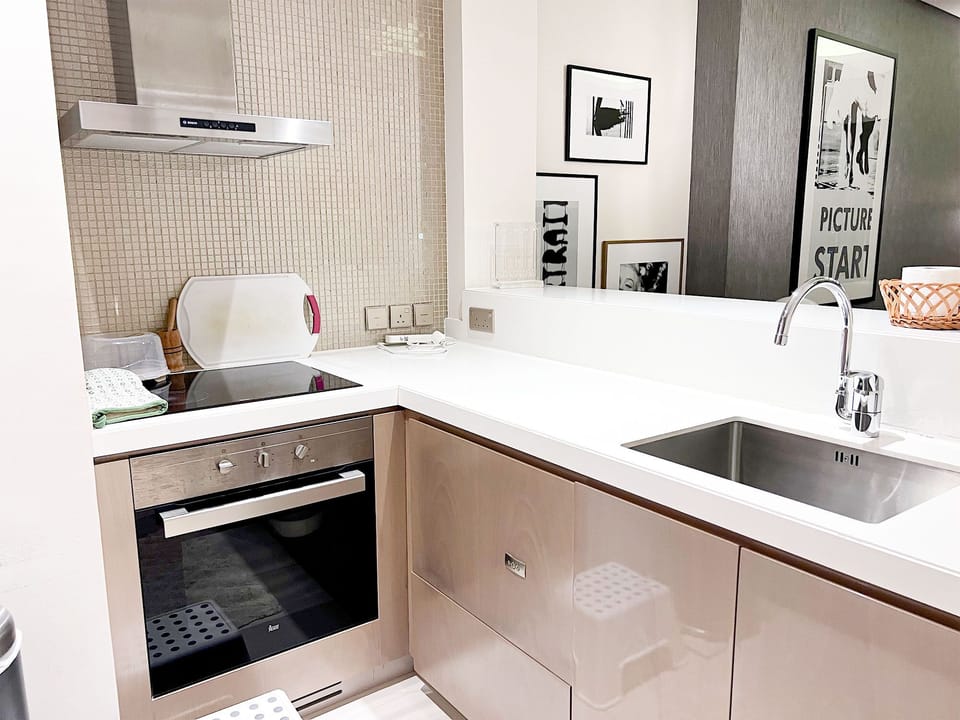 Deluxe Apartment, City View | Private kitchen | Coffee/tea maker, electric kettle