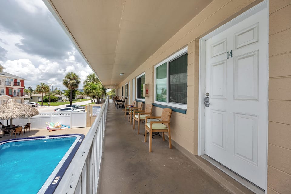 Terrace overlooks the Pool and Tiki Huts