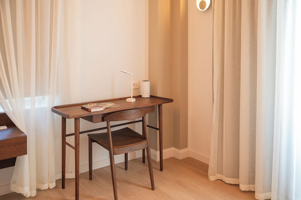 Superior Suite, Balcony, Sea View | Hypo-allergenic bedding, in-room safe, soundproofing, iron/ironing board