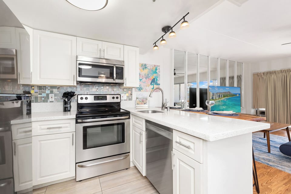 Cook with ease—fully equipped kitchen with sleek finishes