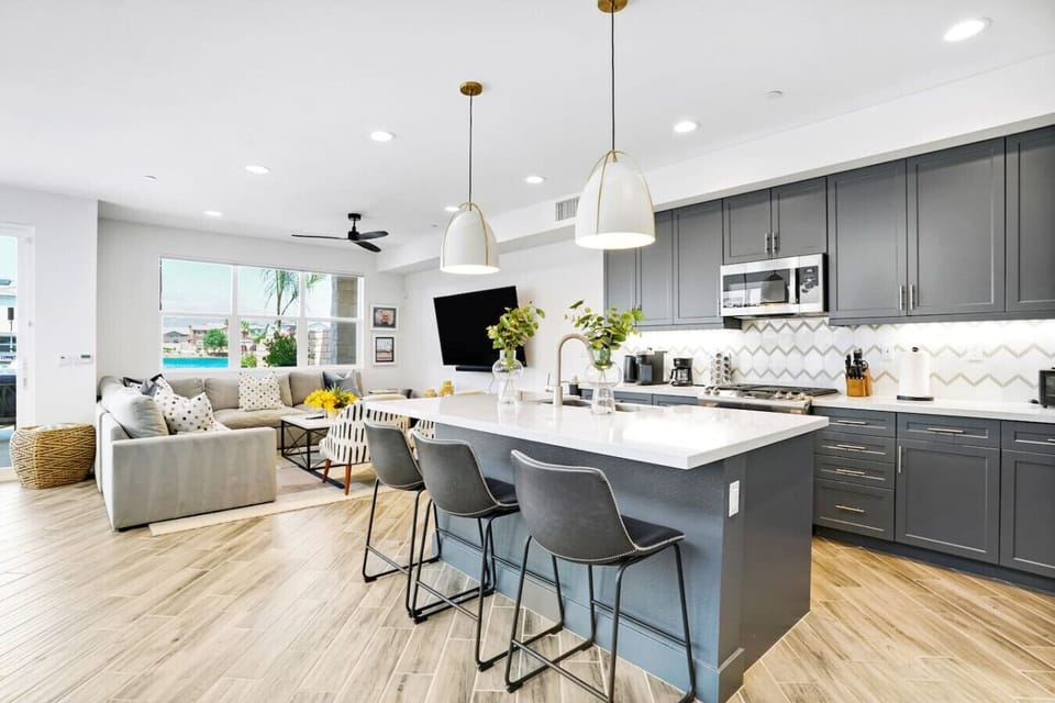 Contemporary comfort: spacious kitchen, cozy living, chic design