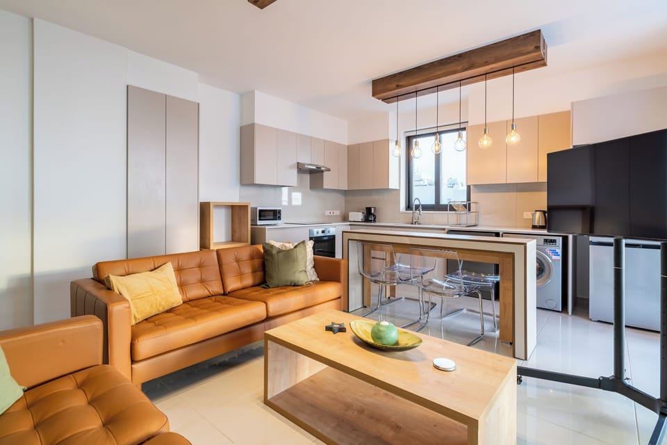 Apartment, 2 Bedrooms, Kitchen, City View | Living room | 55-inch Smart TV with digital channels