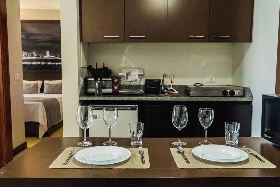 Fridge, microwave, cookware/dishes/utensils