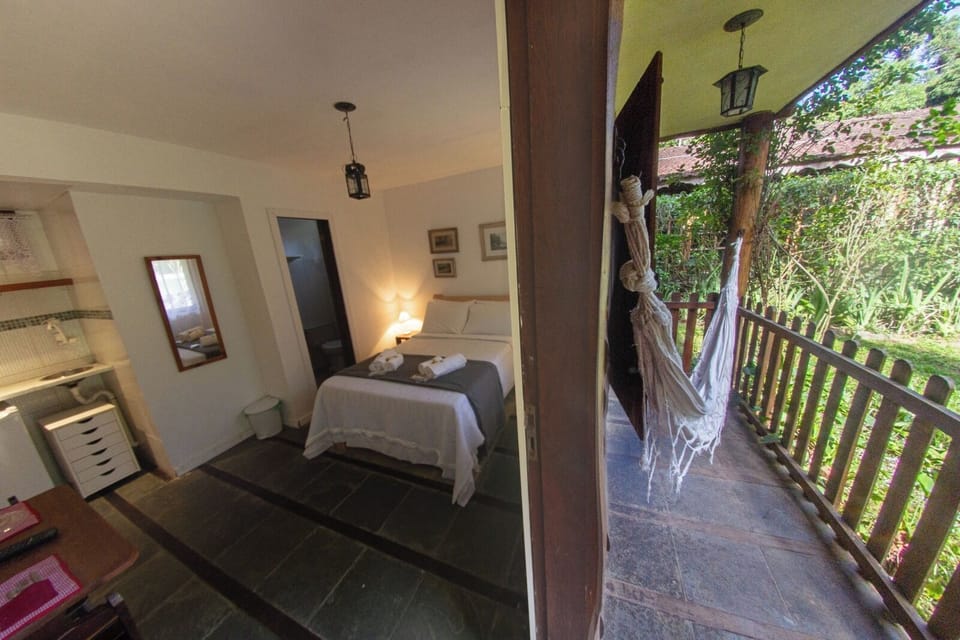 Basic Double Room, Lanai, Garden View | Laptop workspace, free WiFi