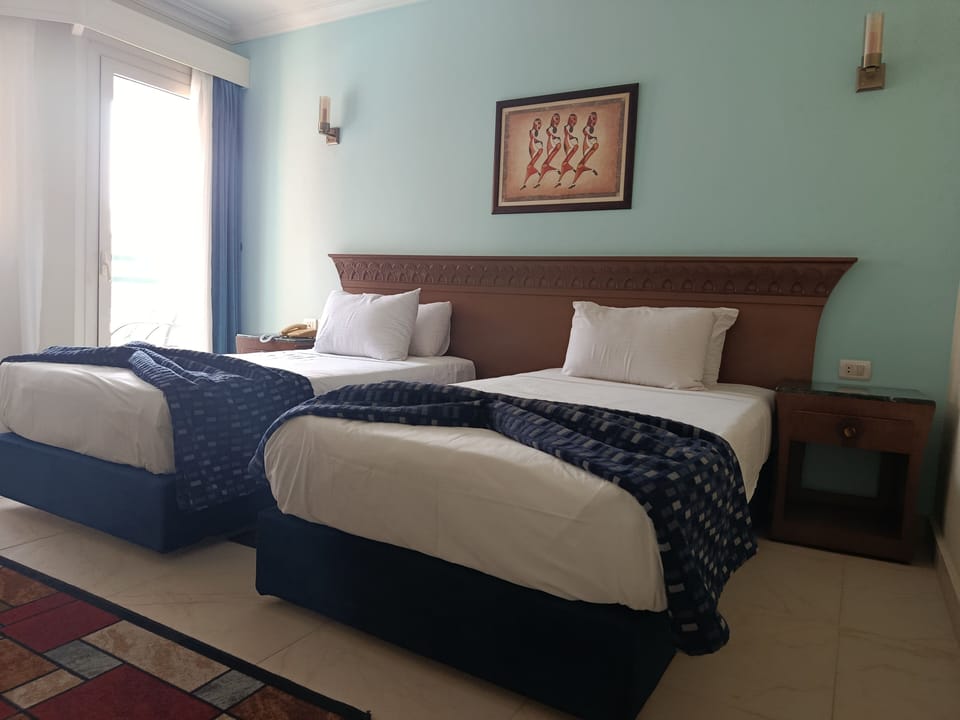 Standard Double Room, Pool View | In-room safe, blackout drapes, soundproofing, free WiFi
