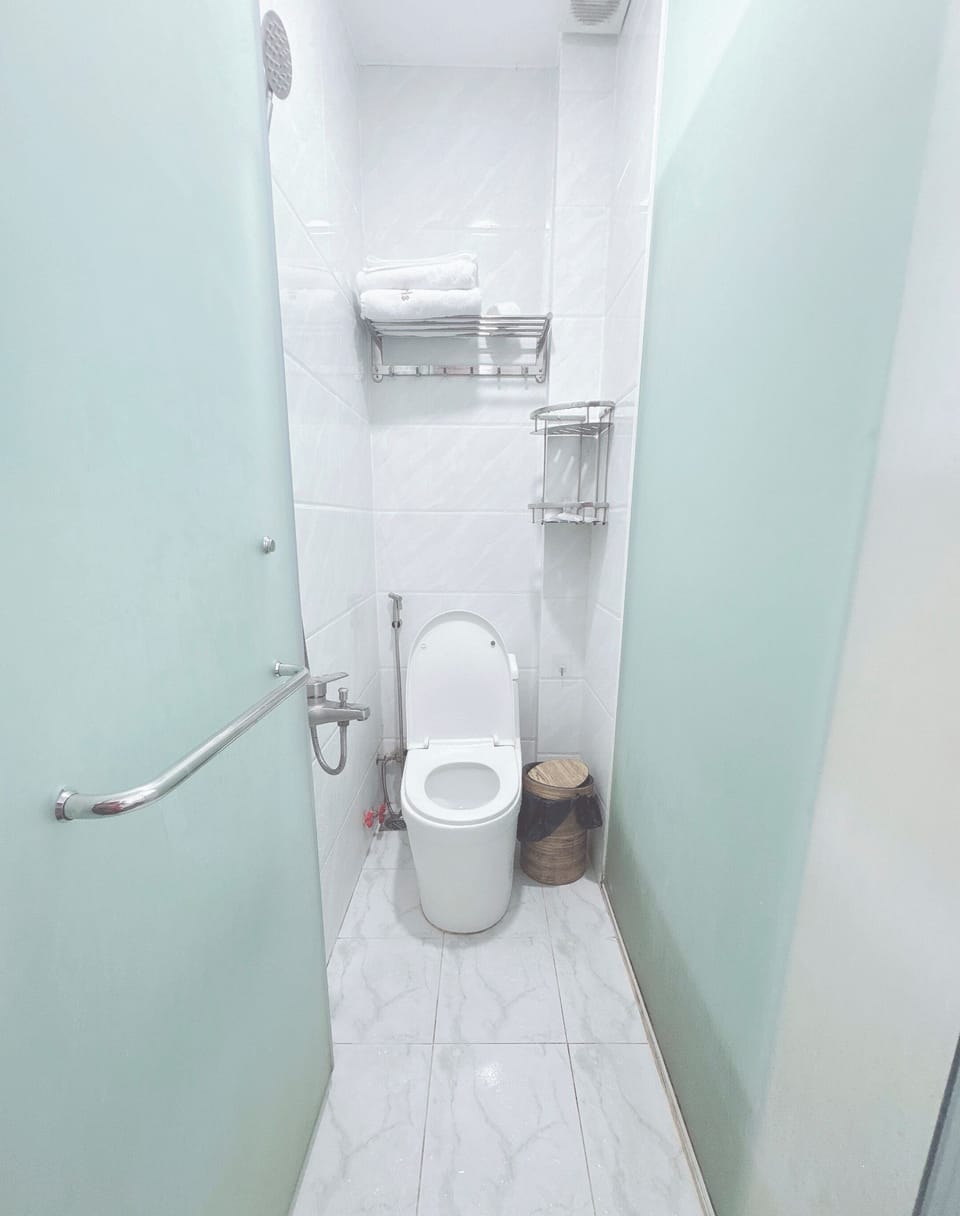 Basic Room, City View | Bathroom | Shower, hair dryer, towels, soap