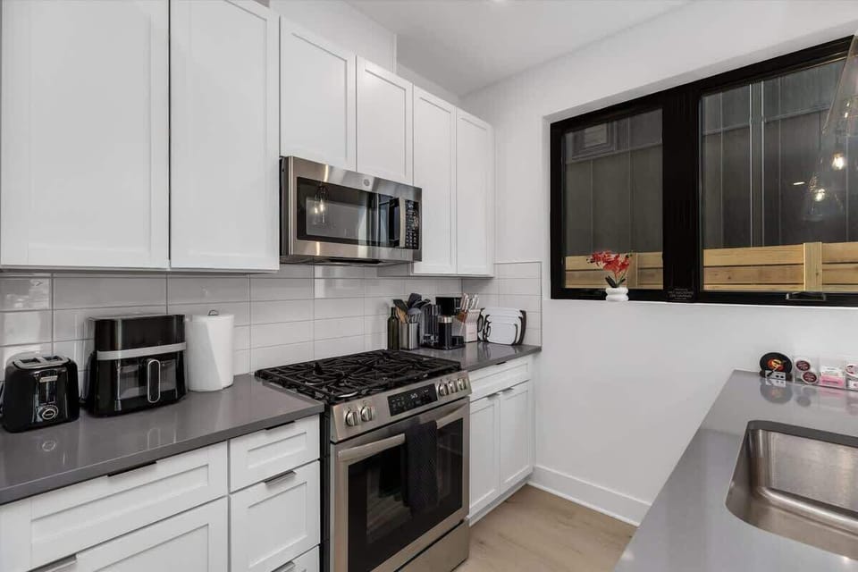 The fully equipped kitchen offers ample storage and all the essentials you need for effortless meal prep.
