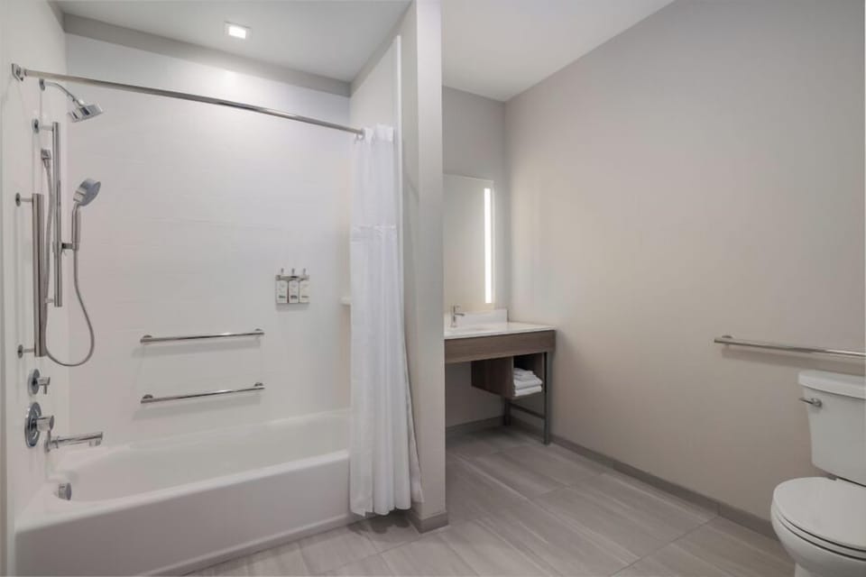 Suite, 2 Queen Beds, Accessible (Mobility) | Bathroom | Combined shower/tub, hair dryer, towels, soap